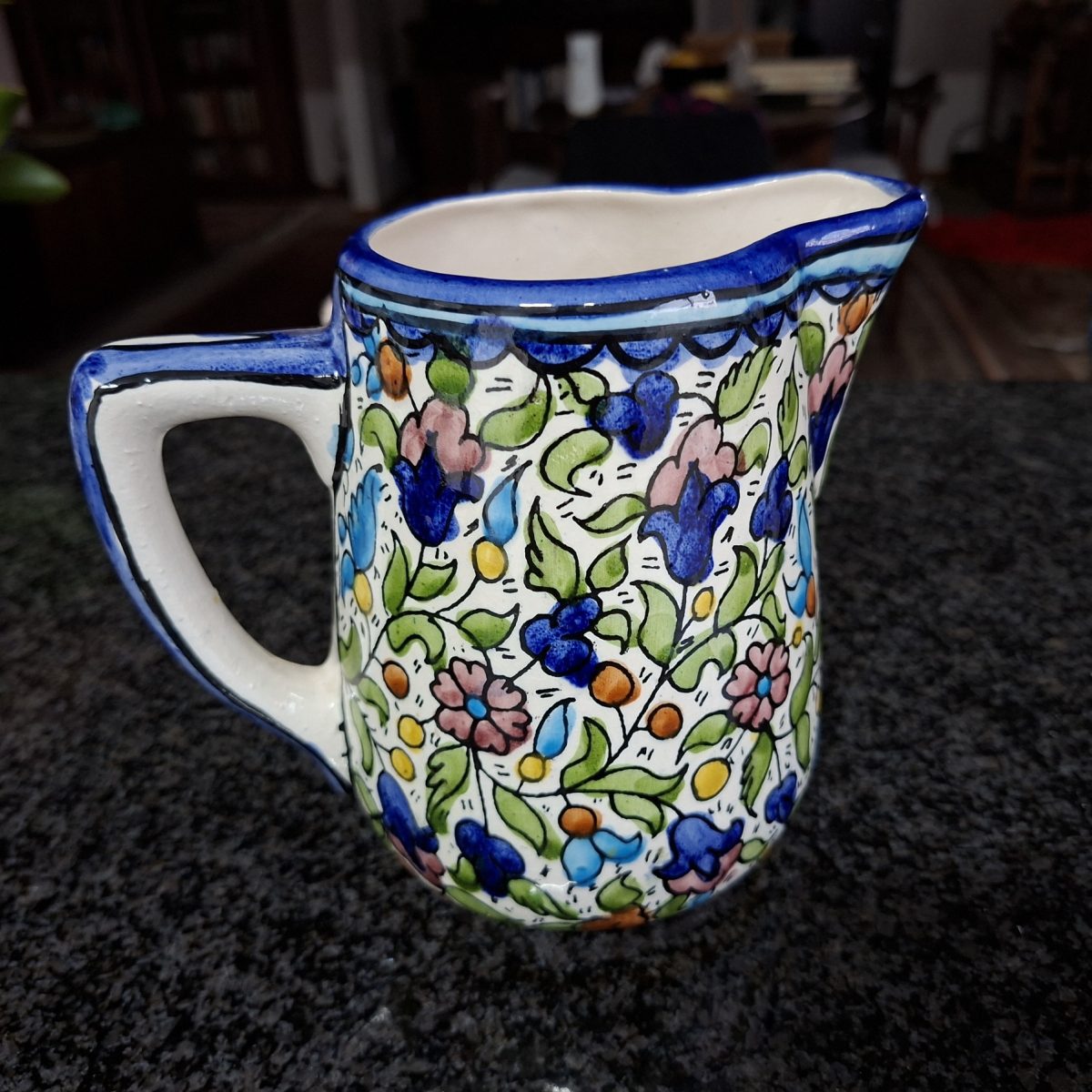 Vintage Jerusalem pottery jug - flowers and leaves blue and white