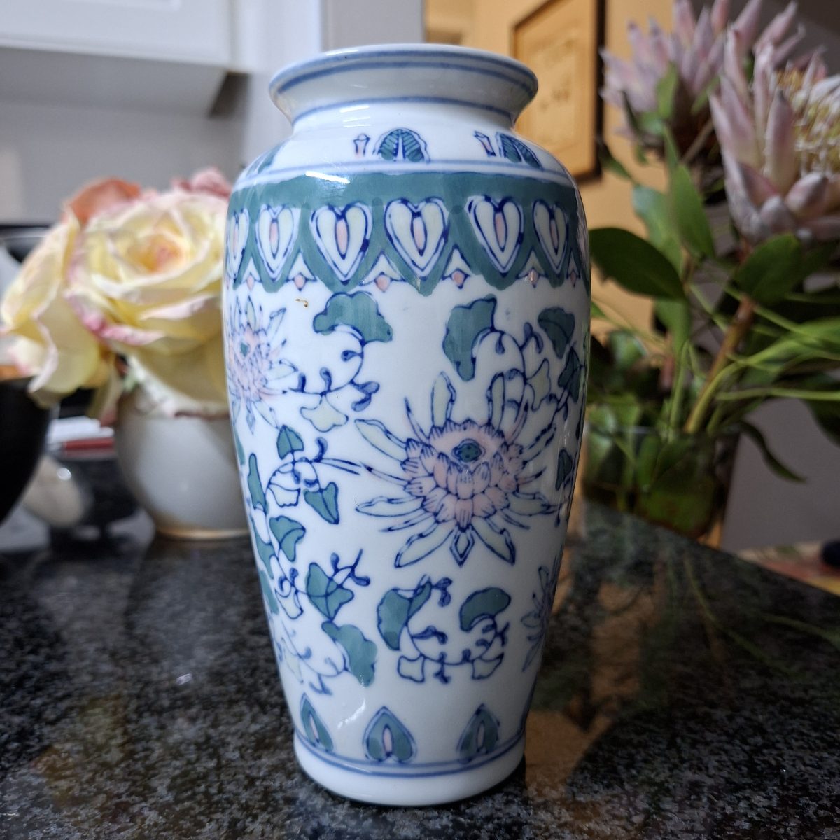 Chinese vase with flowers and leaves 20 cms tall