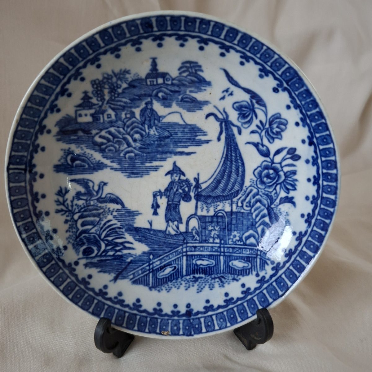 Early Worcester 1775 / 1790 1st period tea saucer -  flow blue Fisherman and Cormorant