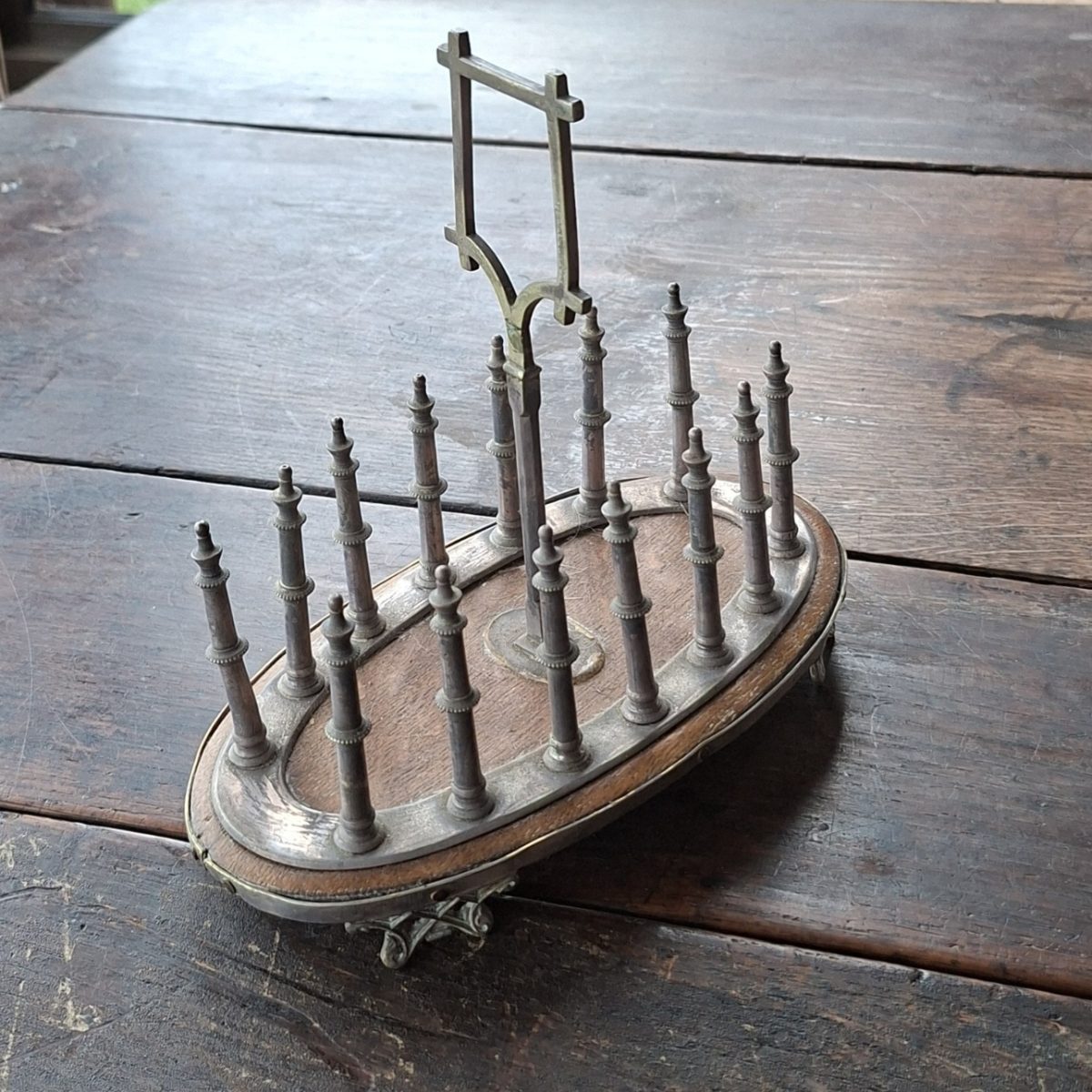 Gothic silver plated toast rack on oak base with four feet - late 1800's  T.H and S.