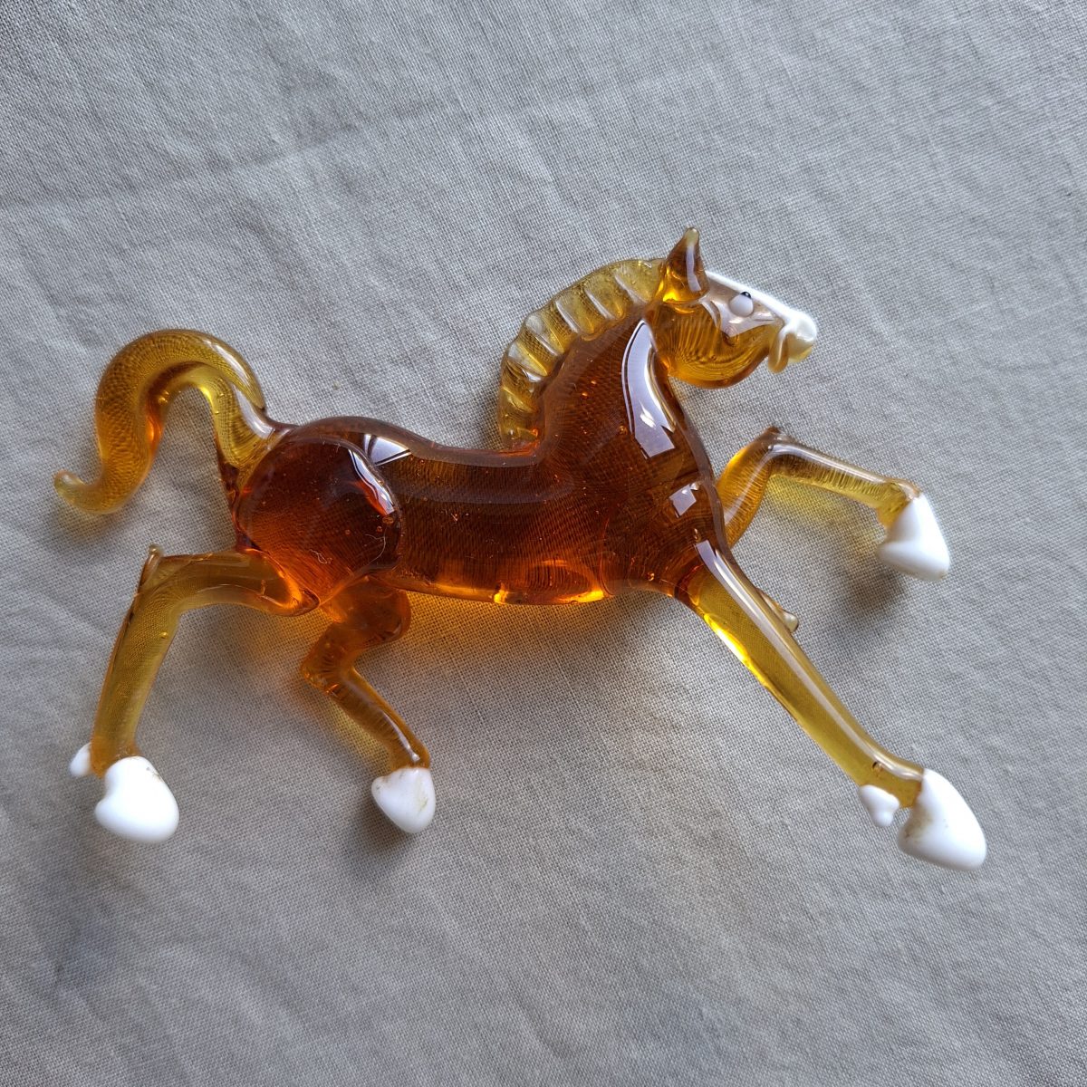 Little Art glass amber galloping horse - italian glass? White hooves and a blaze
