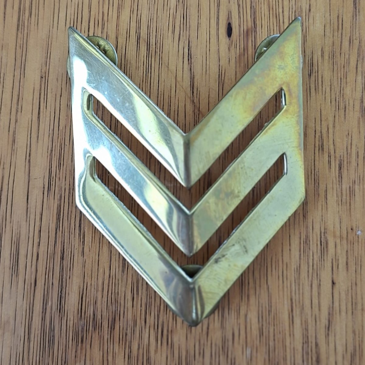 Army? Sargents brass chevron arm badge and 2 pips