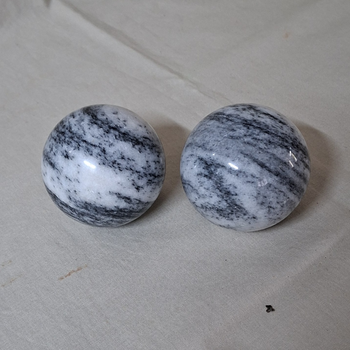 2 Polished marble decorative spheres, balls.