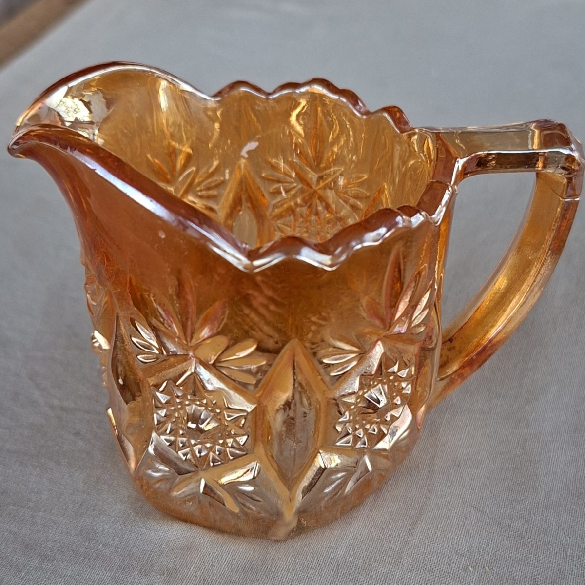 Carnival Glass cream milk jug - irdescent amber