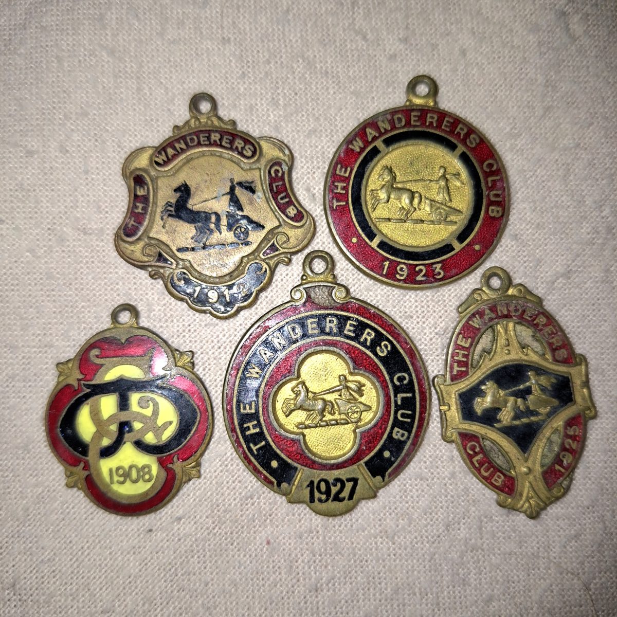 4 Enamelled Wanders Club badges pins tokens 1912, 23, 25 and 1927