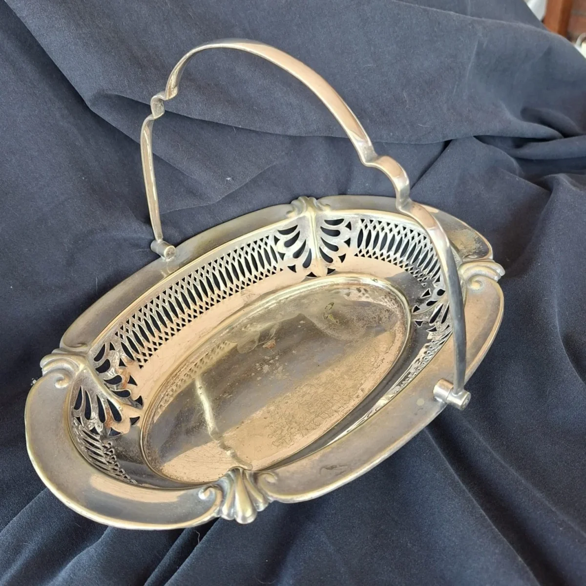 Silver electro plate pressed basket with handle.  Fruit biscuits bread.  Open work gallery rim