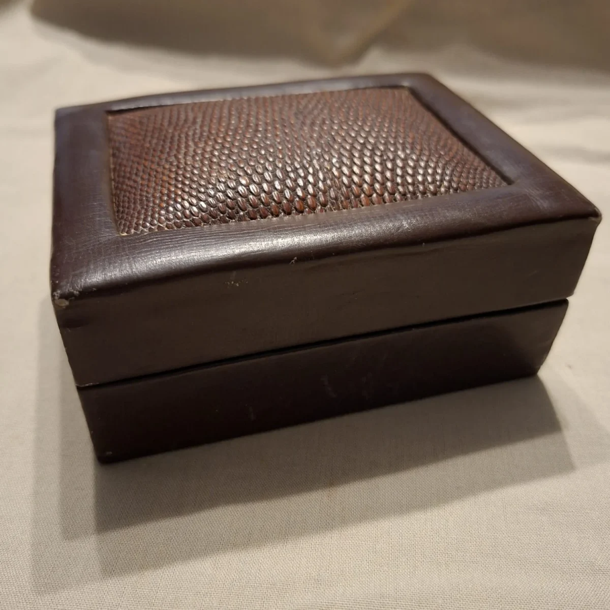 Wooden jewelry box covered with leather and Lizzard skin inset
