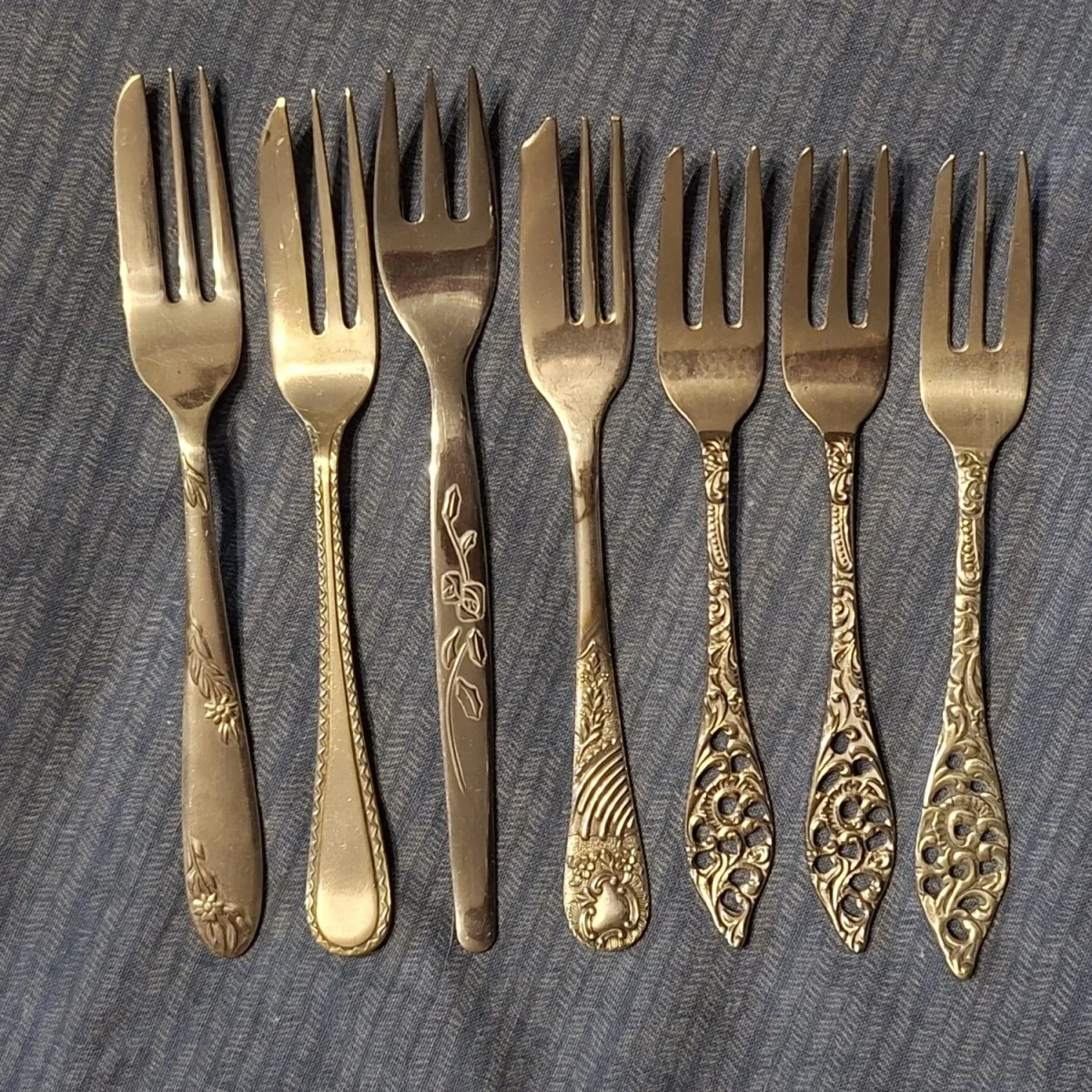 7 cake forks - different designs