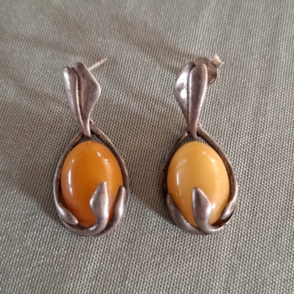 Pair of silver earings  with creamy amber opaque "stones"