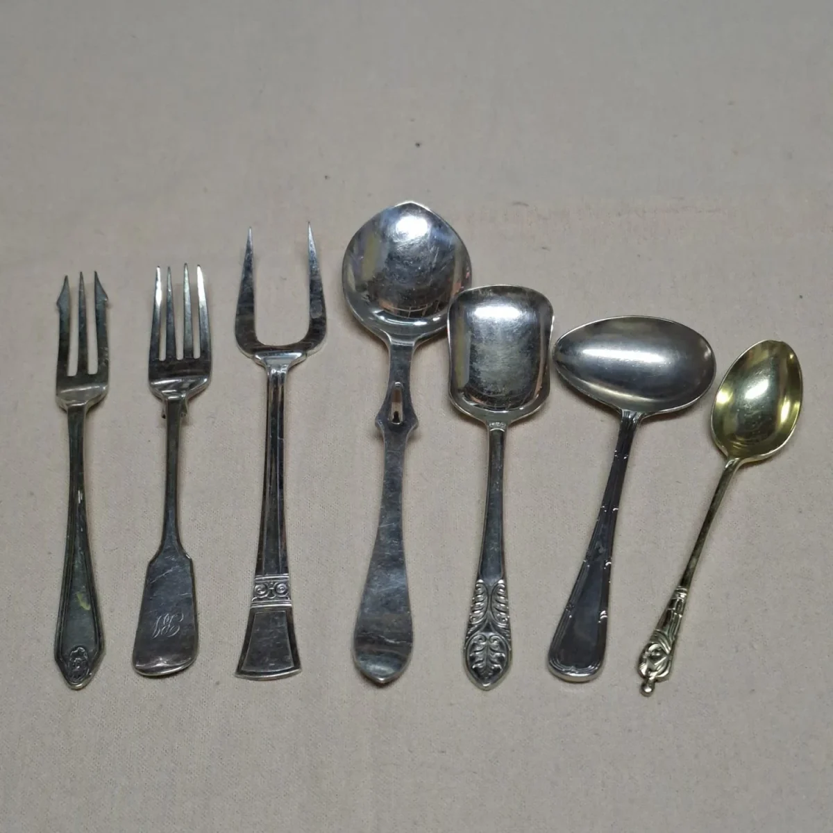 7 odd silver plated teaspoons and forks