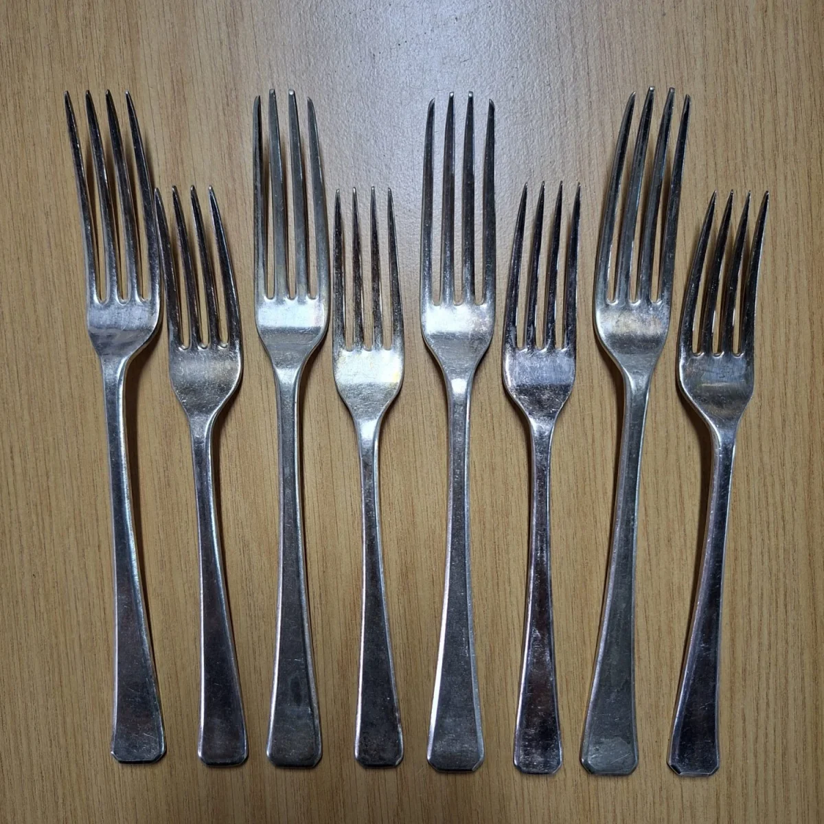 8 Vintage Forks  4 dinner forks and  desert forks