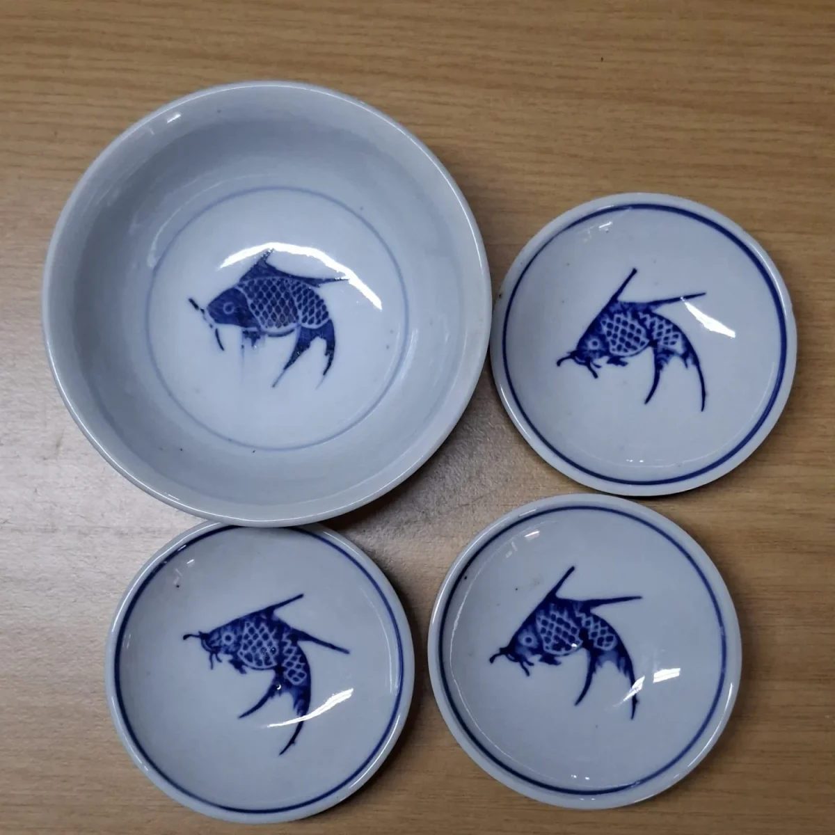 Chinese blue and white bowls with cobalt koi fish motif
