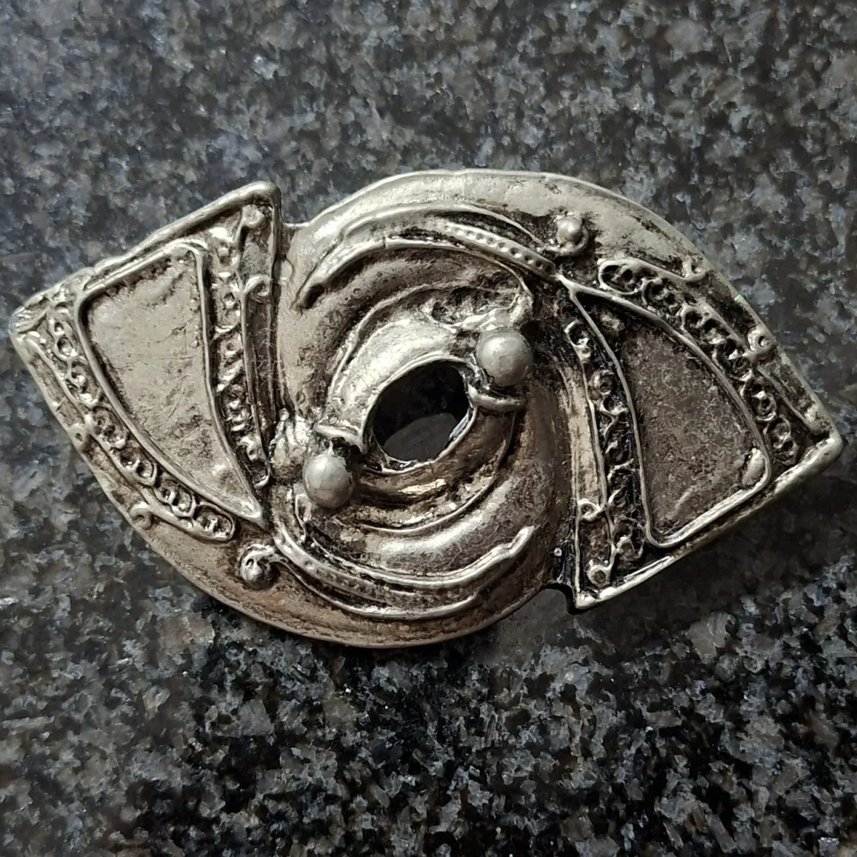 1970's belt buckle.   Chunky silver metal 11 cms x 6 cms